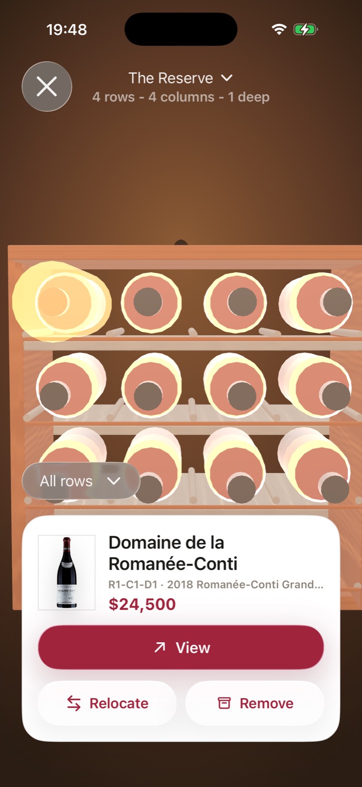 One bottle lit in its slot on a 3D rack, with its position and value on a card below